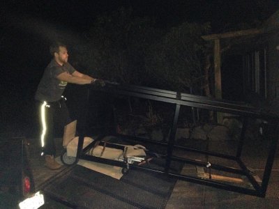 My brother helping unload the Main Tank Stand (web).jpg