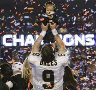 brees and son.jpg